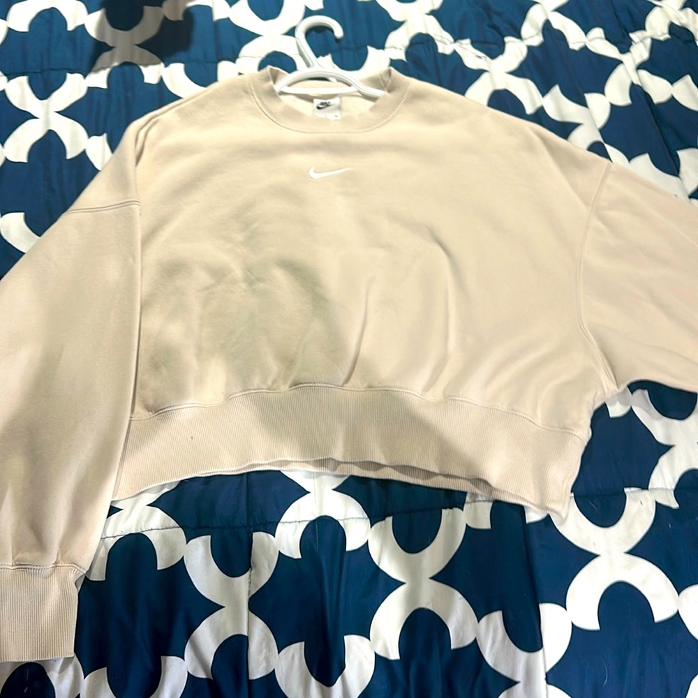 Nike- woman’s crop top, crew neck, cream colour sweater.